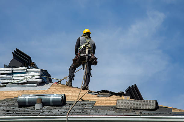 Professional Gutter Installation technician working in Fishers Island, NY